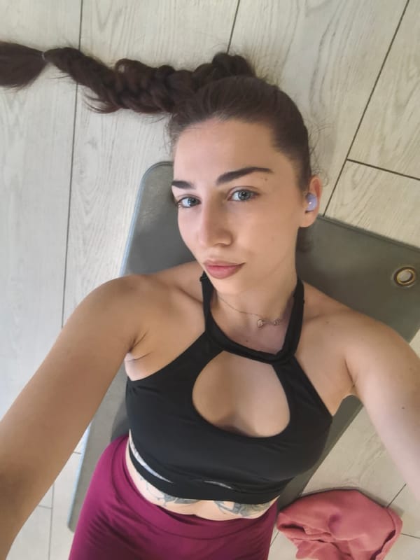 Woman takes selfie during yoga session in Bulgaria