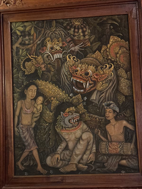 Restaurant interior featuring traditional Balinese art documented in Kuta