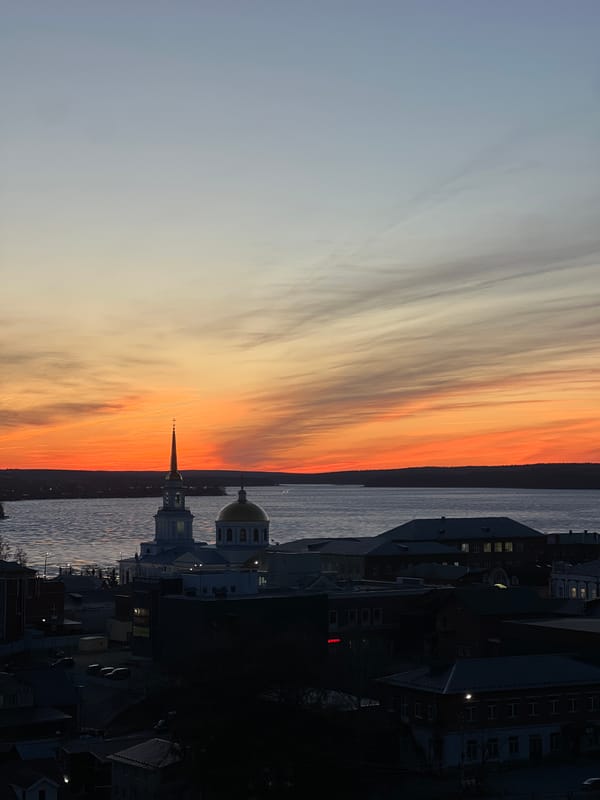 Vibrant sunset captures cityscape over Votkinsk, Russia