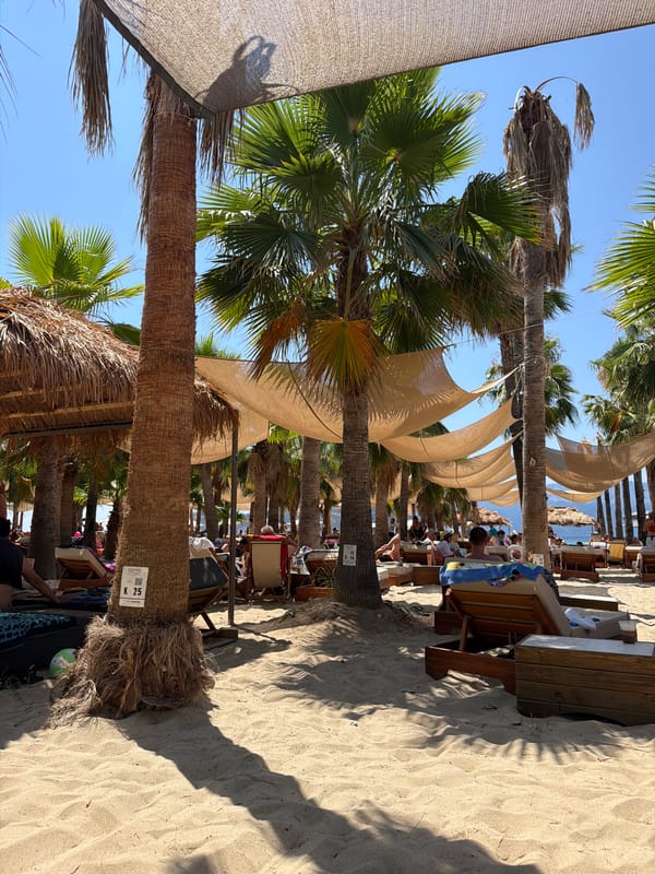 Lazy morning on a palm-lined beach in Keramoti, Greece