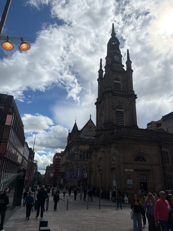 Tourist activity captured at Nelson Mandela Place, Glasgow