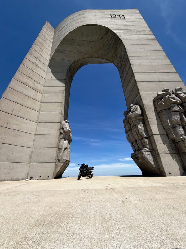Motorcyclists visit Arch of Freedom Monument in Bulgarian mountains