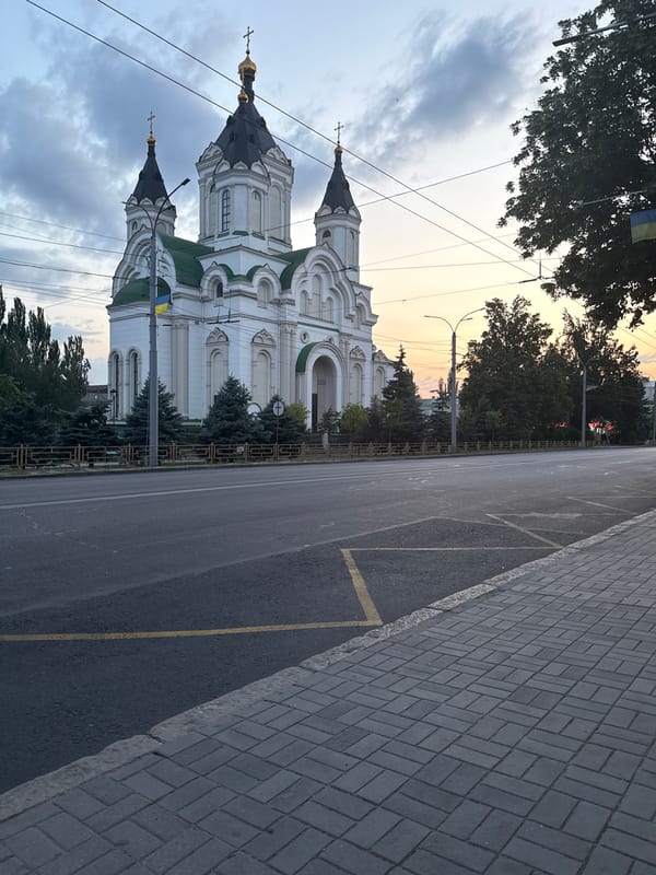 Orthodox church with golden domes flies Ukrainian flag in Zaporizhzhia