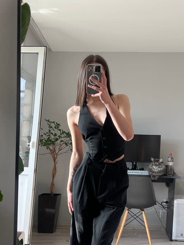 Woman takes mirror selfies in Ternopil room