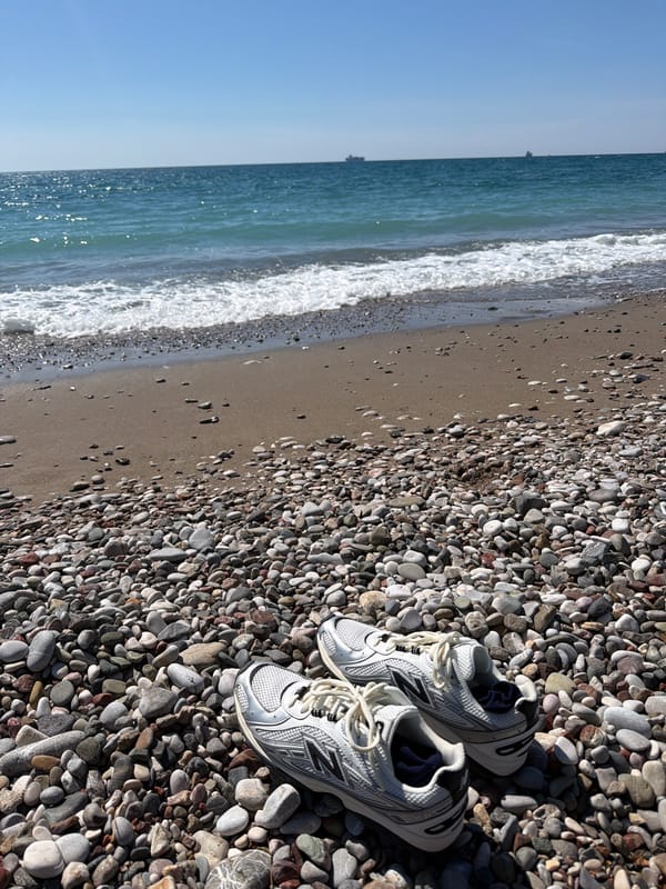 Sneakers left on Montenegro beach amid calm seas