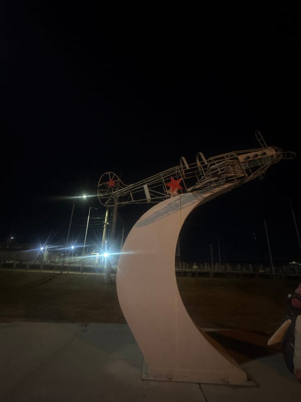 Evening scenes captured around Krasnoyarsk including monuments and street life