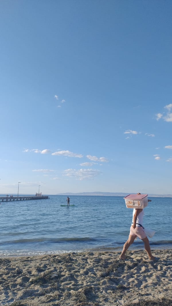 Beachside vendor and selfie moment in Perea, Greece