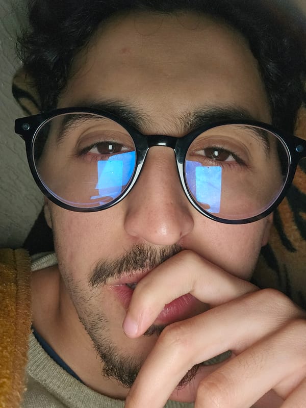 Person in glasses photographed in close-up in Fez