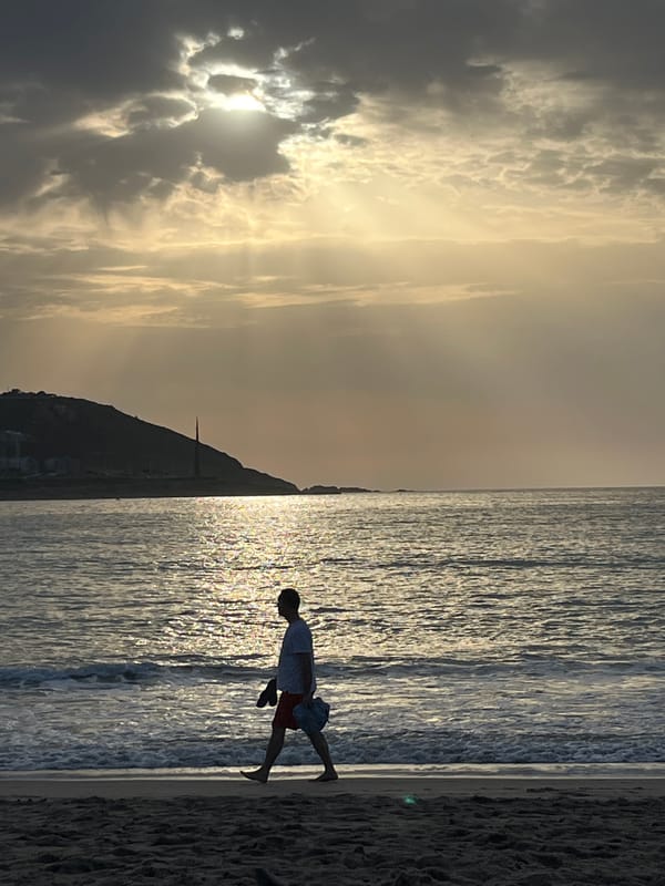 Evening sunset scenes captured across A Coruña beaches and streets