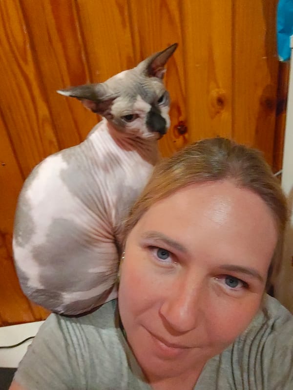 Woman Takes Multiple Selfies with Sphynx Cat in Pyatigorsk