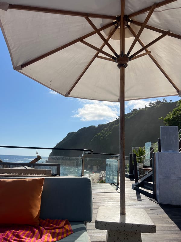 Seaside patio lounge area observed Sunday morning