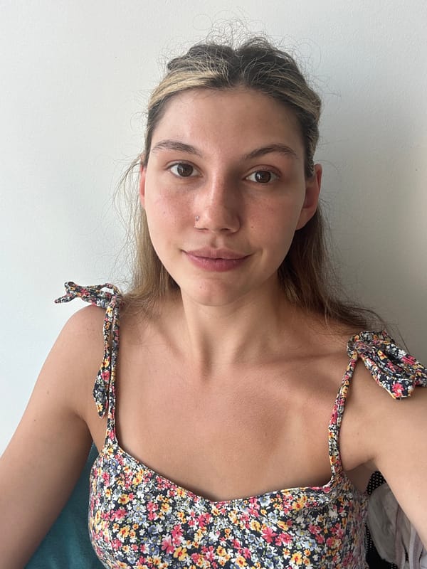 Woman relaxes on balcony in Koh Samui morning