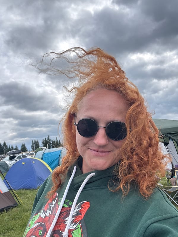 Woman photographed at outdoor gathering in rural Russia