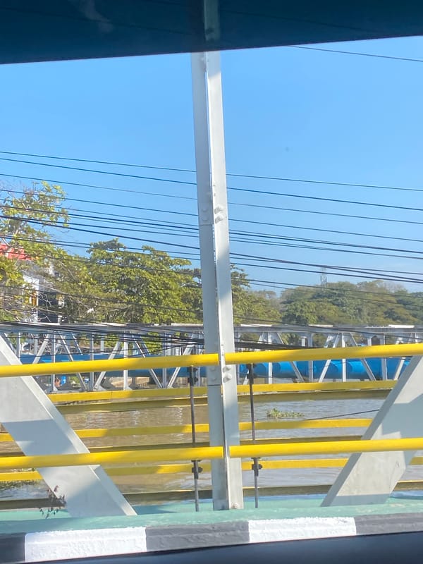Along Banjarmasin's waterways on a clear afternoon