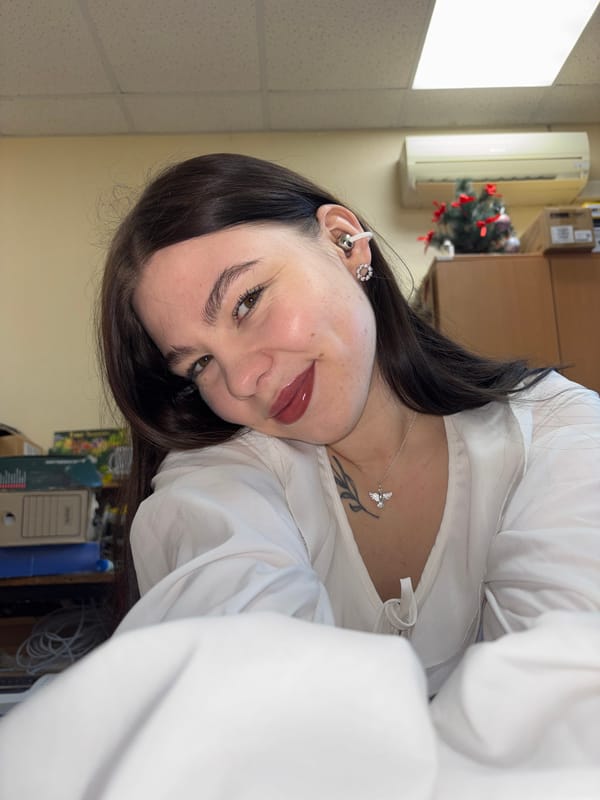 Woman photographed twice in office setting in Perm