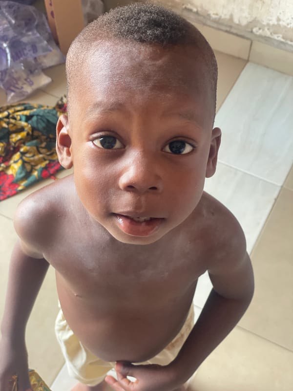 Child photographed in multiple portraits over 9 minutes in Lokoja