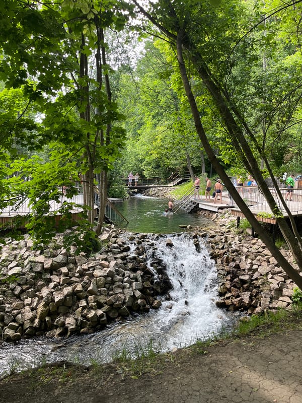 Small waterfall over rocky embankment in a Kazan park