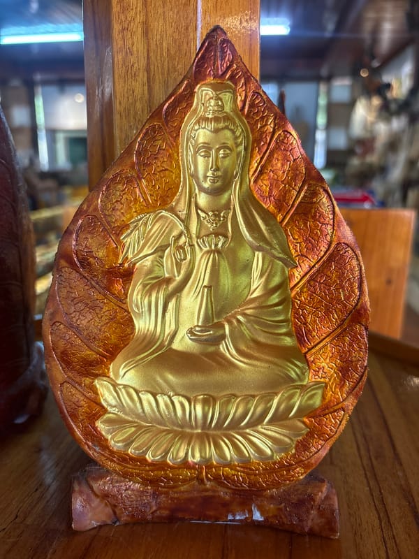 Religious figurines and souvenirs on display in Đà Nẵng