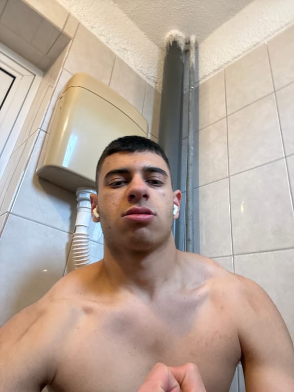 Young man photographed in bathroom and gaming setup in Sofia