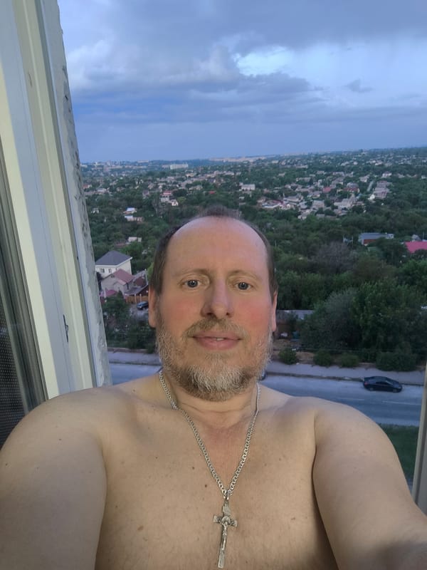 Man takes selfie, gas station viewed in Zaporizhzhia