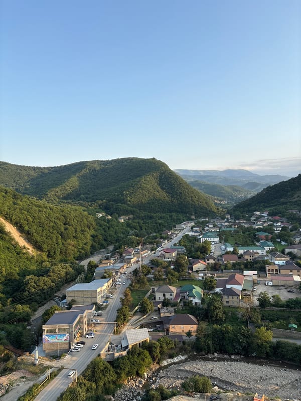 Mountain village of Khuchni seen from above at golden hour