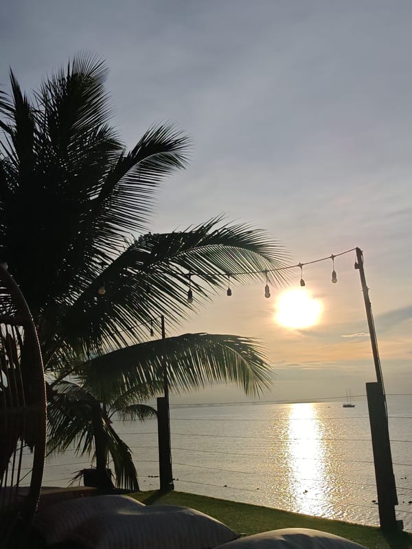 Sunset drinks at a laid-back beach lounge in Baan Tai