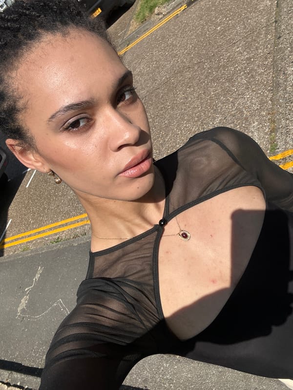 Person in black top observed on London street