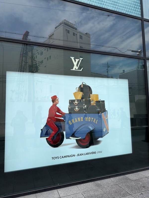Louis Vuitton storefront observed in Osaka street scene