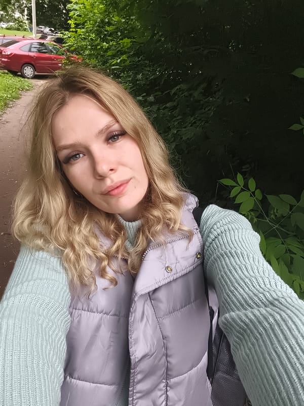Woman takes outdoor selfies in early morning Izhevsk
