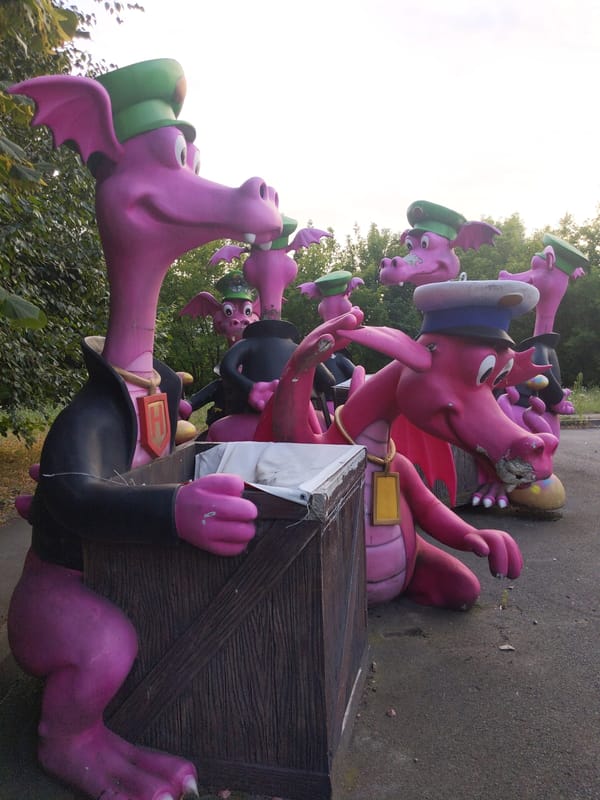 Pink cartoon dragon statues spotted around Kyiv's streets and parks