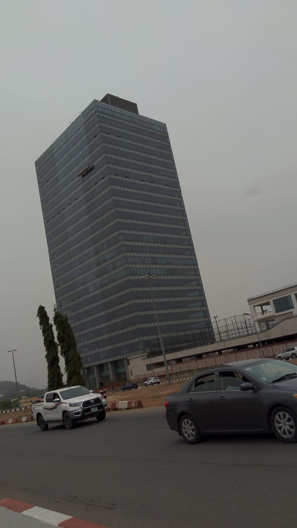 Overcast morning scenes documented around Abuja's modern skyline
