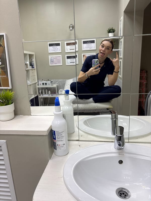 Woman takes selfie in beauty treatment room in Murino
