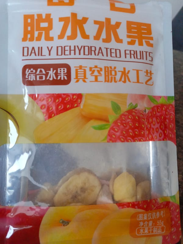 Bilingual dehydrated fruit package documented by independent witness