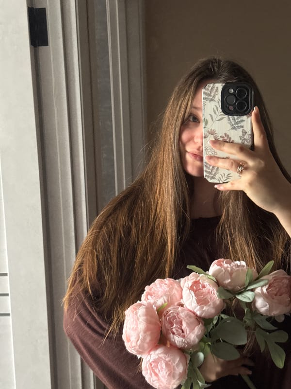 Woman takes mirror selfies in Krasnodar home Saturday morning