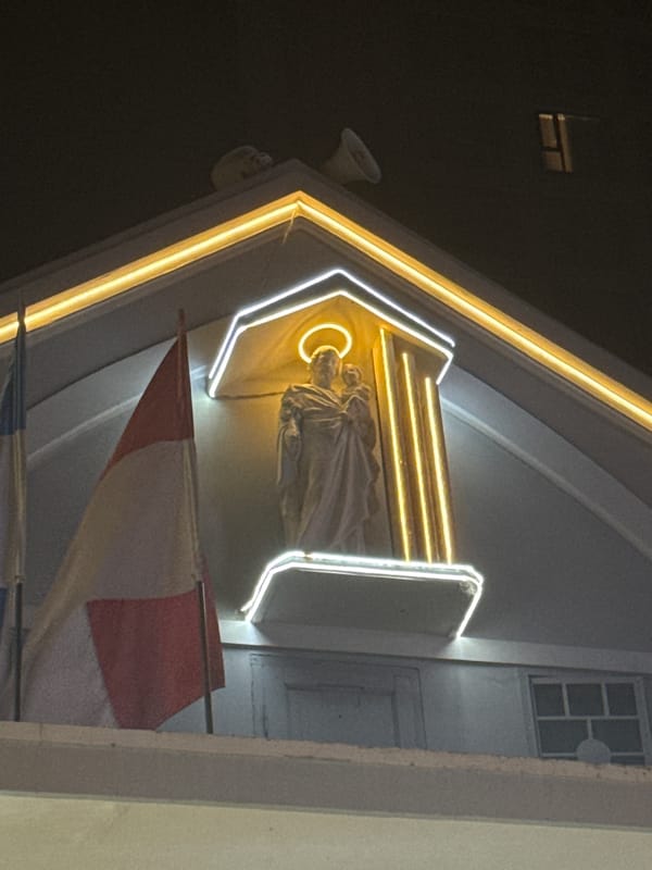 Illuminated religious statues observed at Vietnam church at night