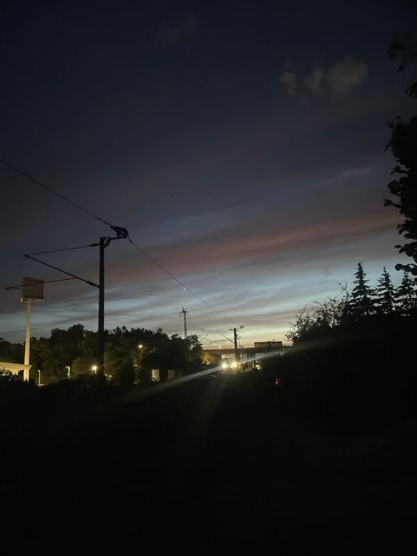 Nighttime railway maintenance operations conducted by crew teams