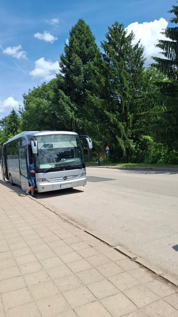 Tour bus stop and industrial equipment observed Monday morning