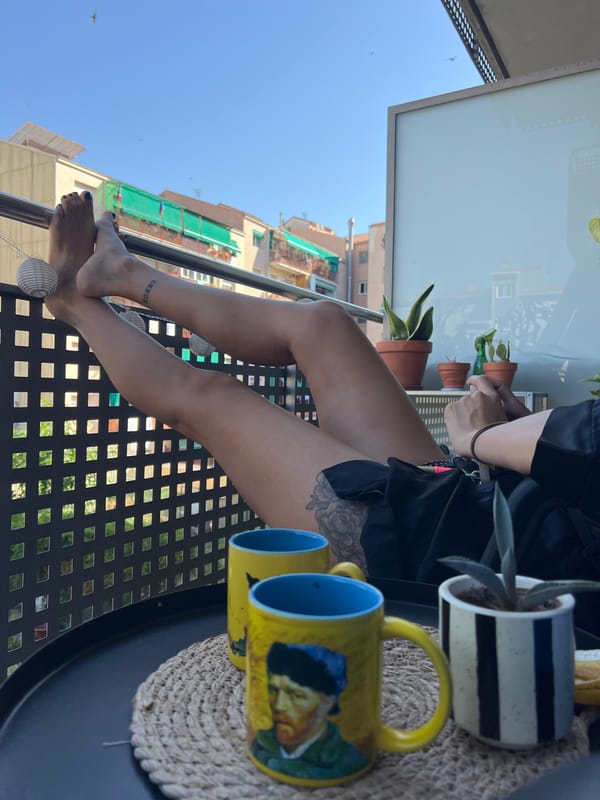 Feet up on a balcony railing in Mollet del Vallès
