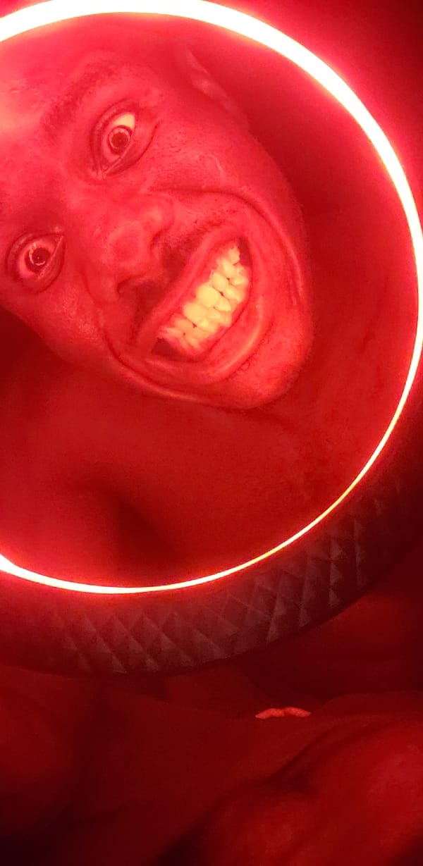 Person photographed under red ring lighting in Narayi, Nigeria