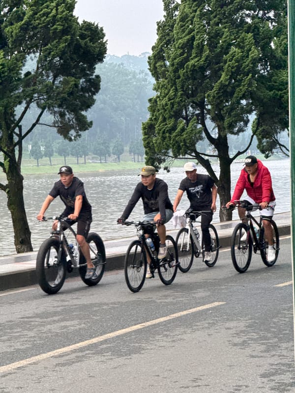 Evening cycling and pedestrian activity around Xuan Huong Lake, Da Lat