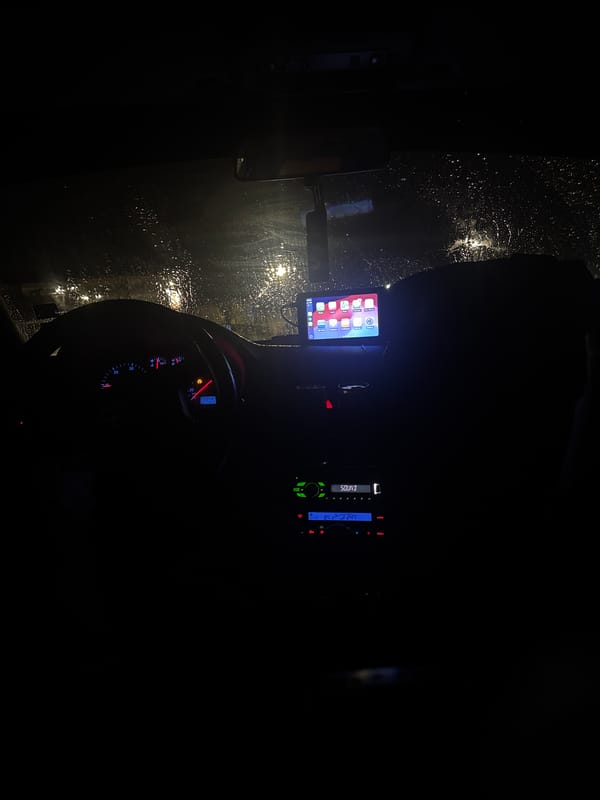 Nighttime car interior view during rain in Bulgaria