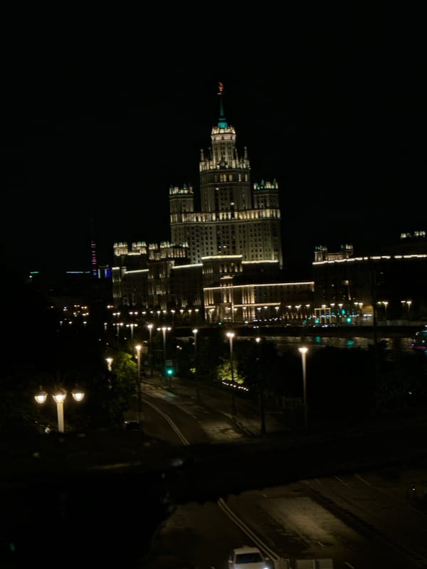 Moscow nighttime cityscape documented by witnesses across river district