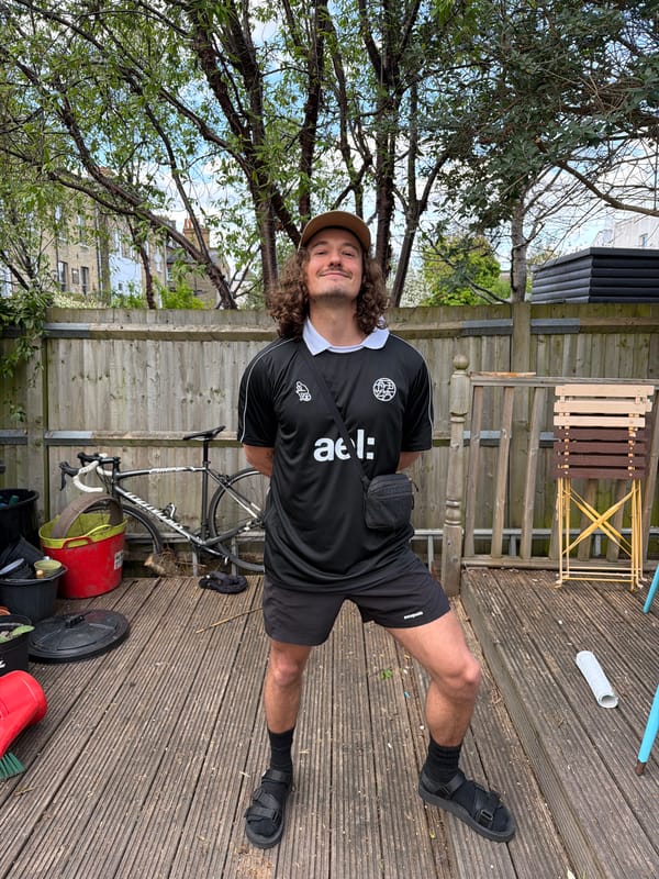 Man in soccer jersey spotted on London backyard deck