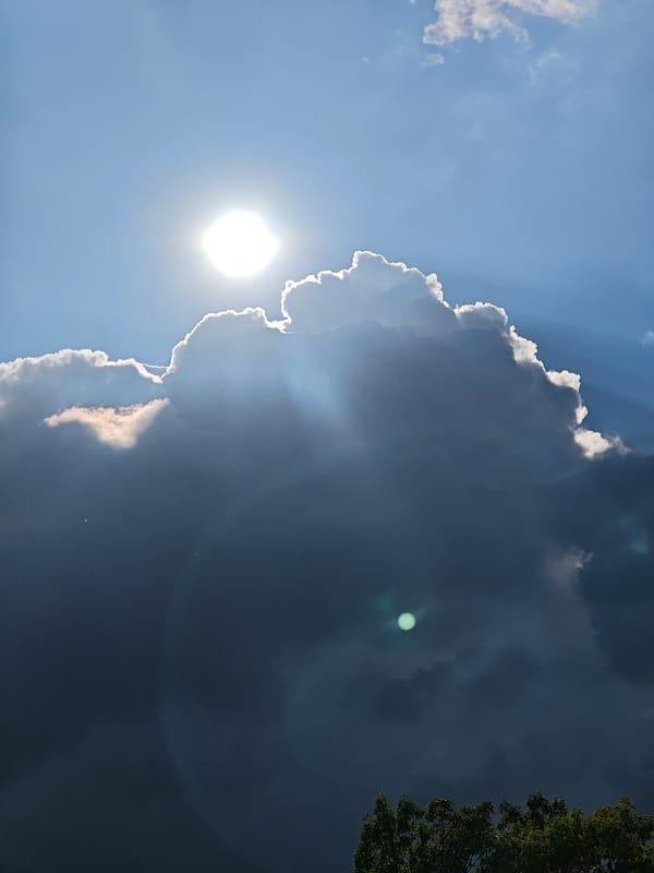 Dramatic sunbeams break through storm clouds over Vratsa, Bulgaria