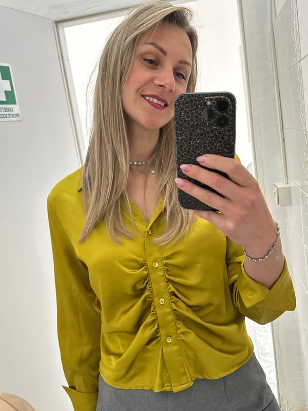 Woman takes bathroom mirror selfies in Venafro, Italy