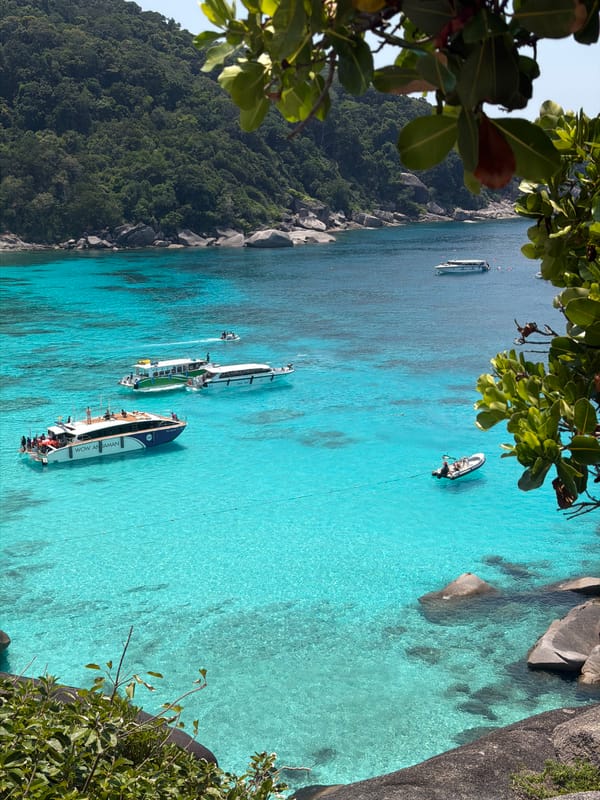 Tourists enjoy snorkeling and sightseeing at Thailand's Similan Islands