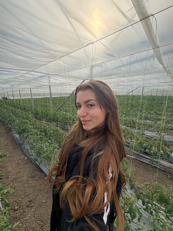 Woman visits greenhouse facility in Struma, Bulgaria