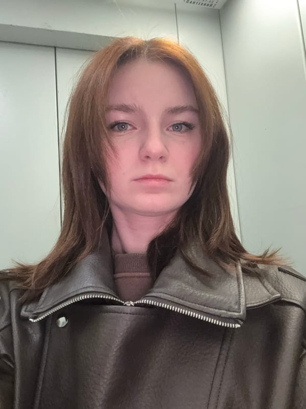Woman Takes Selfie in Brown Leather Jacket in Russia
