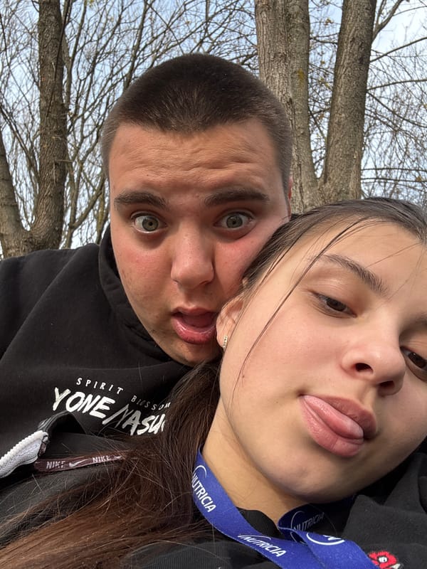 Couple takes selfies in Pleven park during spring afternoon