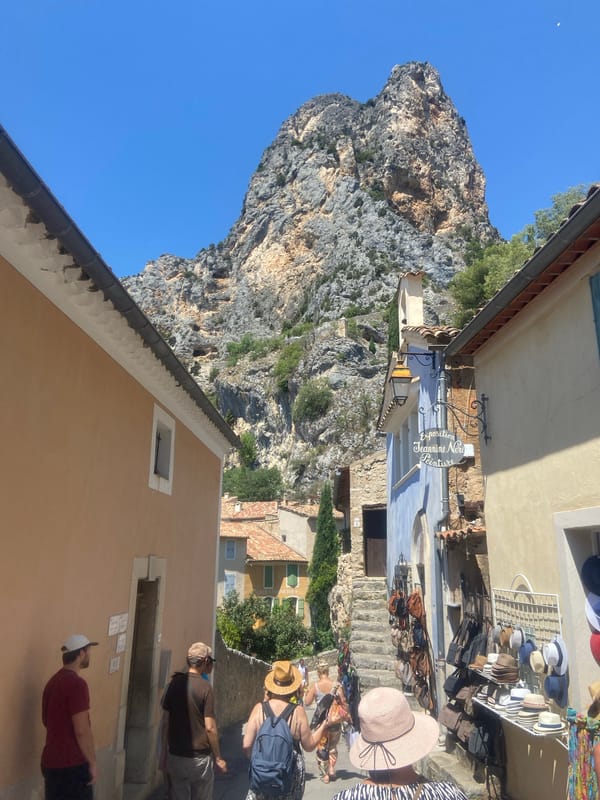 Exploring a sun-drenched hilltop village carved into the cliffs